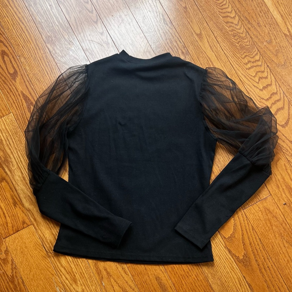 Sheer sleeve top